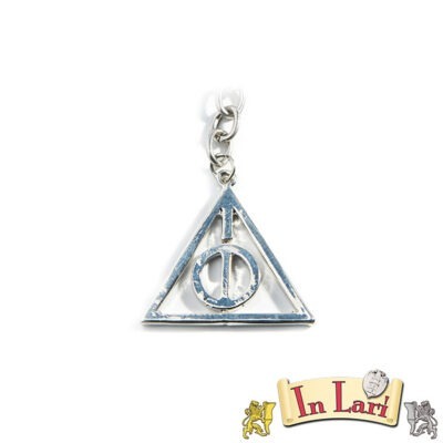 portachiavi dei doni della morte con il cerchio all'interno del pendente che ruota. Dalla saga di Harry Potter